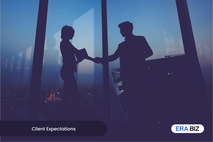 Shaking hands to complete a contract with an IT outsourcing client, Client expectations can be difficult to meet, Era Biz Solutions